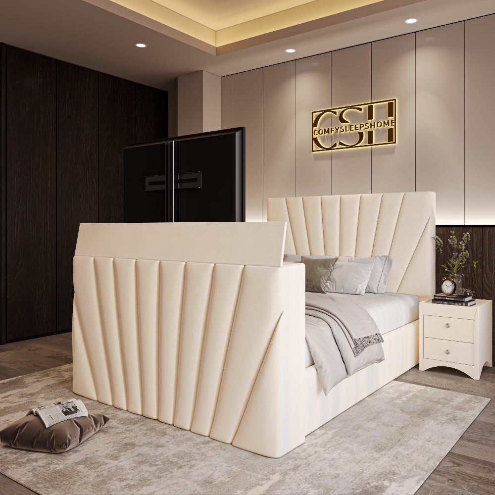 A cream upholstered 2025 The Chelsea TV Bed with vertical panelled headboard and footboard, positioned in a modern bedroom.
