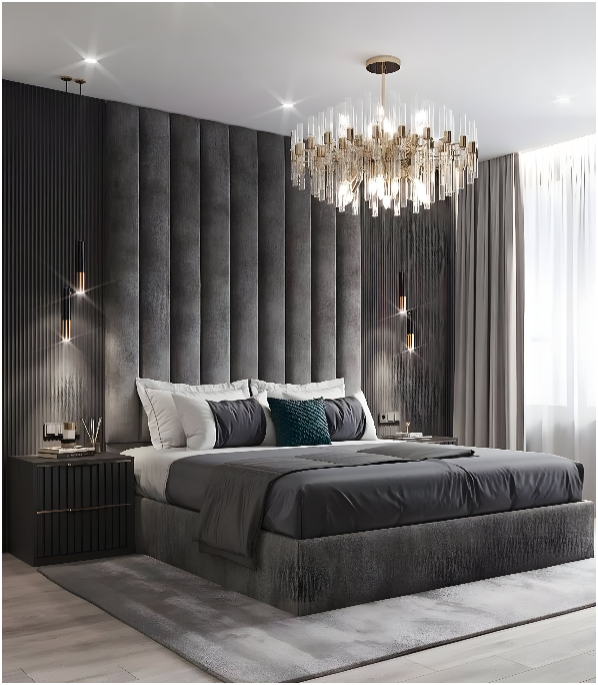 Modern bedroom with a crush velvet bed, tall paneled headboard, and elegant chandelier.