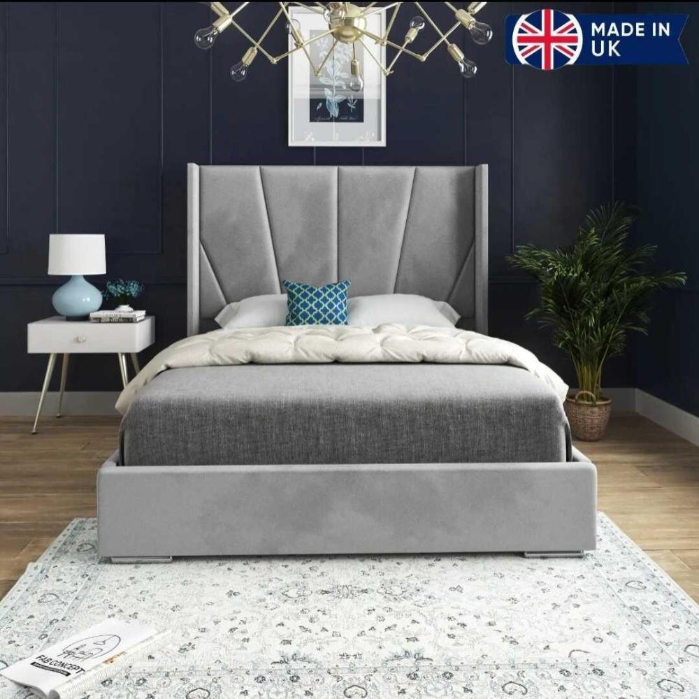 Modern bedroom with a small double wooden bed, gray upholstered headboard, and stylish decor.