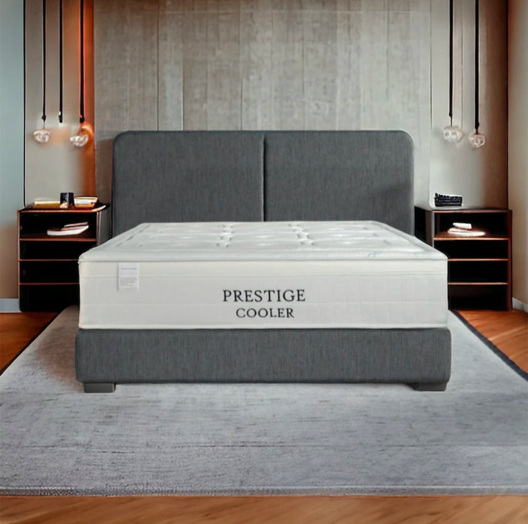 Modern bedroom with a Super King Size Mattress and a gray headboard.