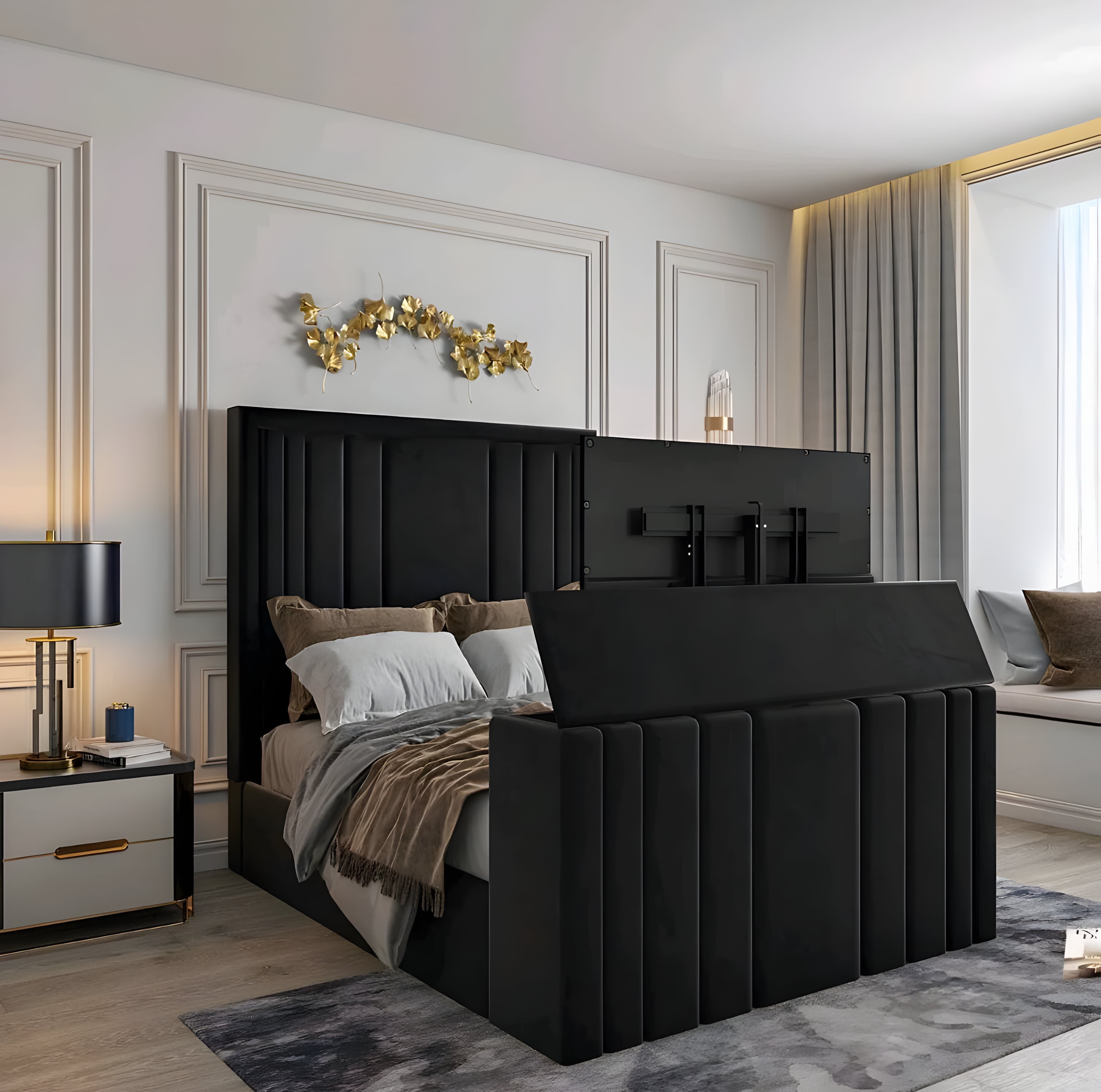 A modern bedroom with a black and integrated TV double bed.