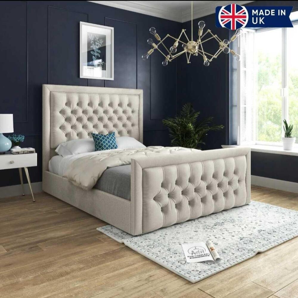 Luxurious bedroom with a tufted double bed size upholstered in light beige fabric.