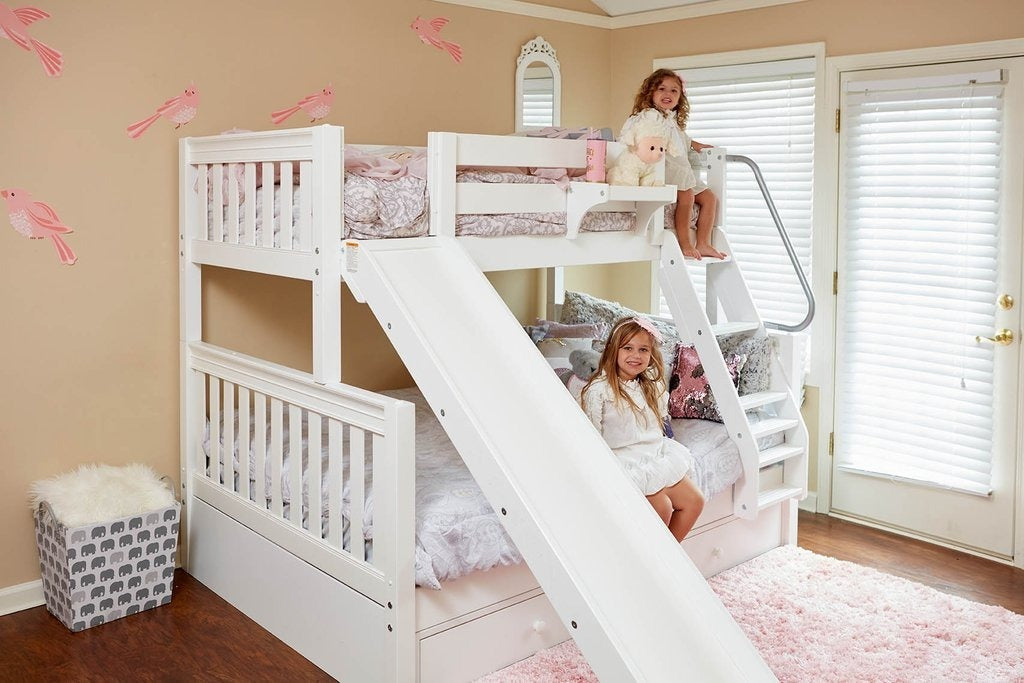 Kids bed with slide in a bright, playful room.