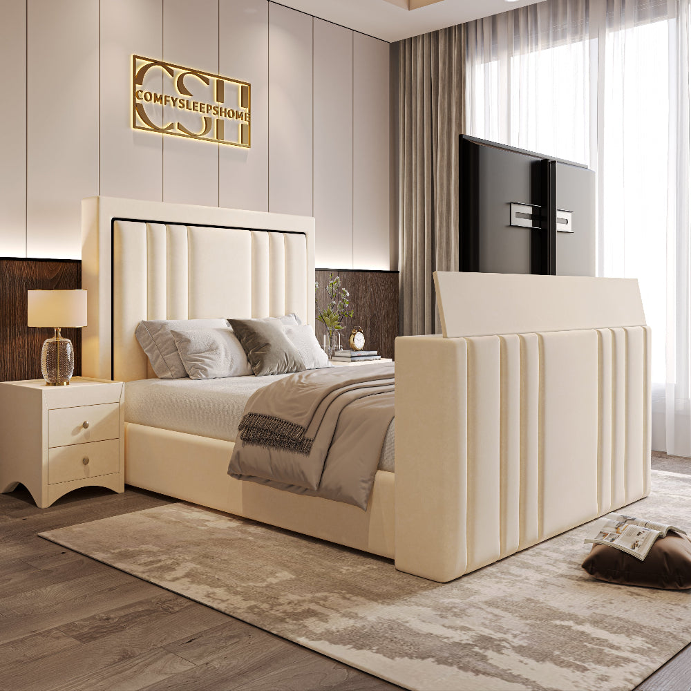 Modern bedroom with a cream plush bed featuring a TV at the footboard, styled as a tv bed, and elegant decor.