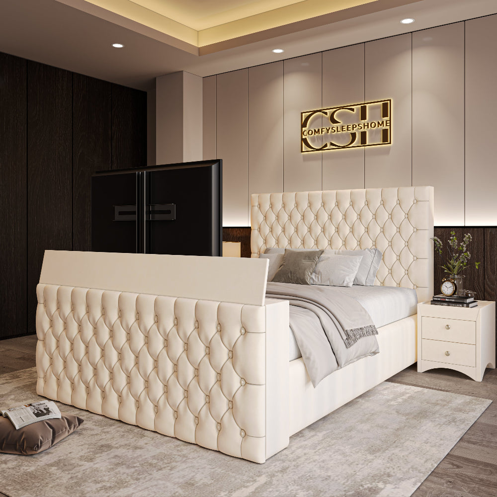 A sophisticated cream 2025 The Chiswick TV Bed with a diamond-tufted headboard and integrated TV, set in a modern bedroom with dark wood accents.